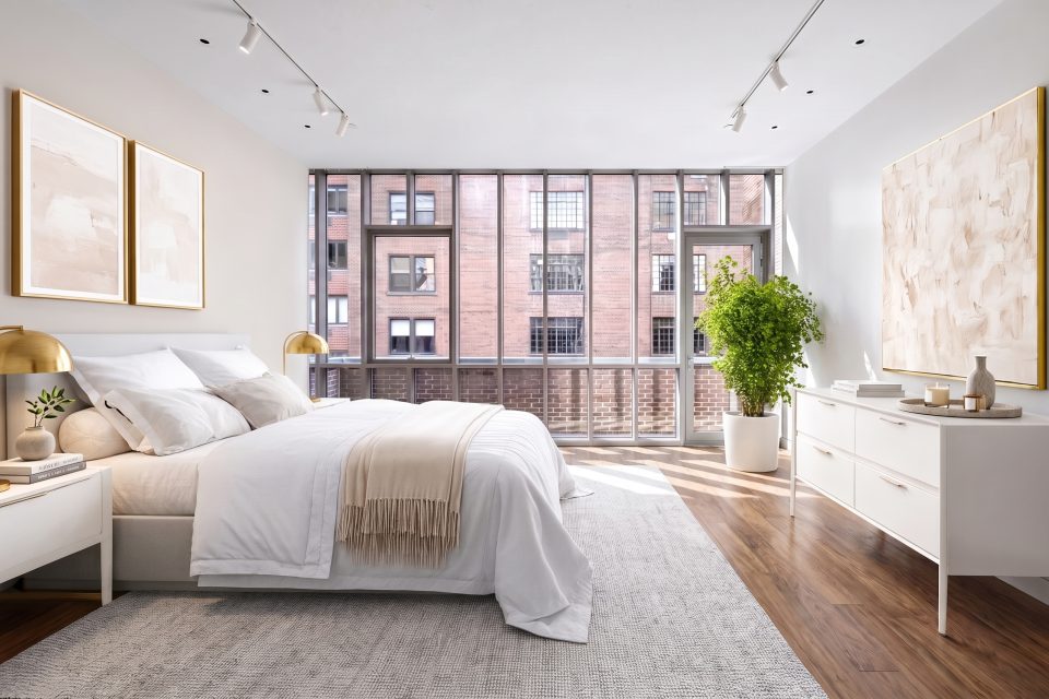 Bedroom virtually staged by TINTY in Contemporary style with sand accents, with a wall of windows and track lights