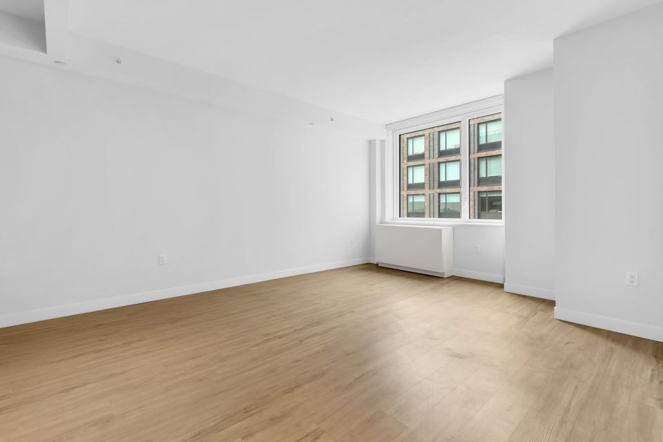Empty studio apartment before virtual staging